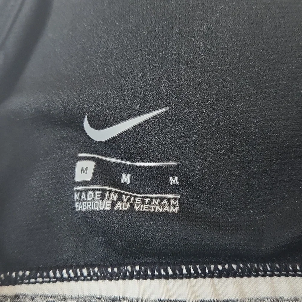 Nike gray tank top with built-in bralett. Size M